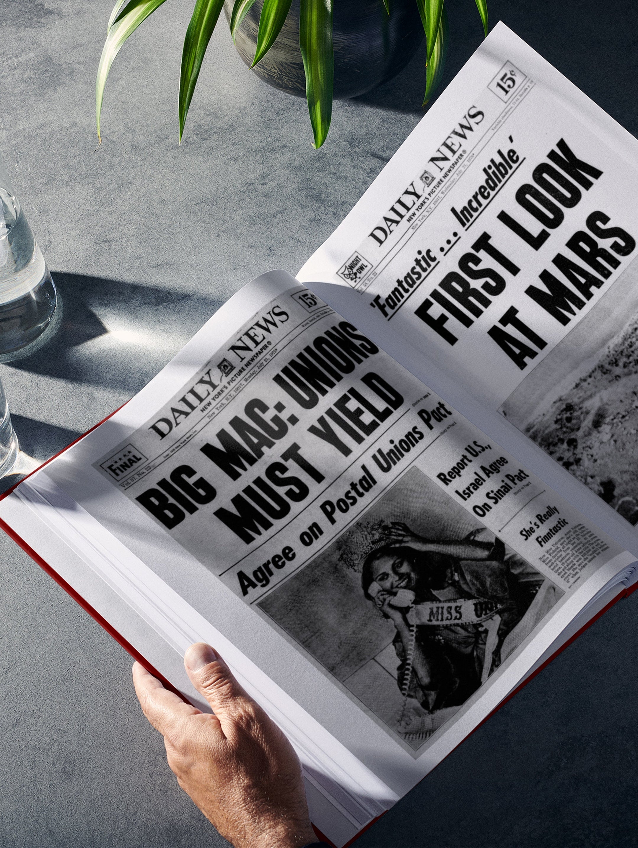 Personalised birthday newspaper book featuring New York Daily News edition in maroon cover by Historic Newspapers.