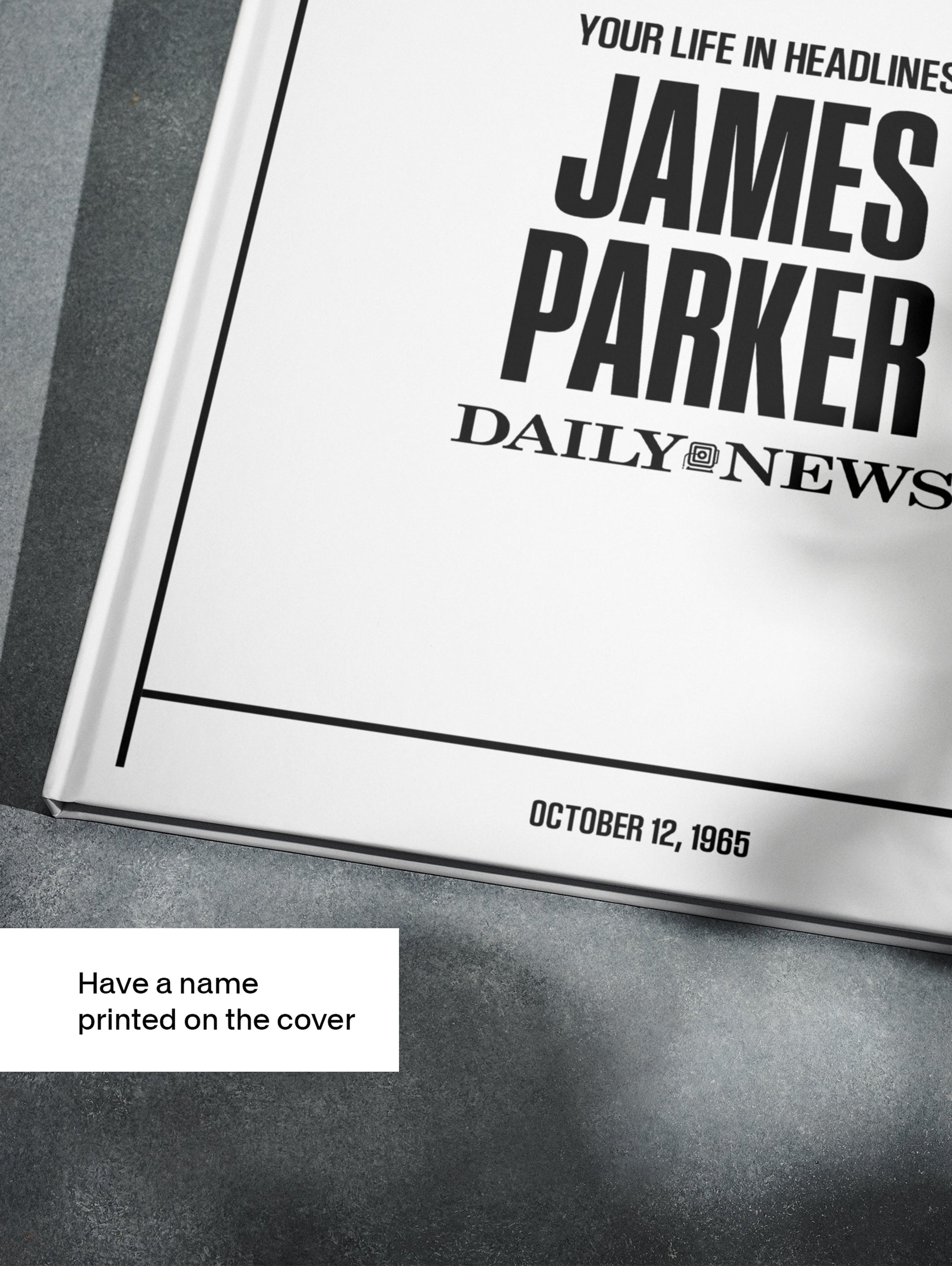 Personalised birthday newspaper book featuring a New York Daily News edition from Historic Newspapers, displayed on a newsstand.