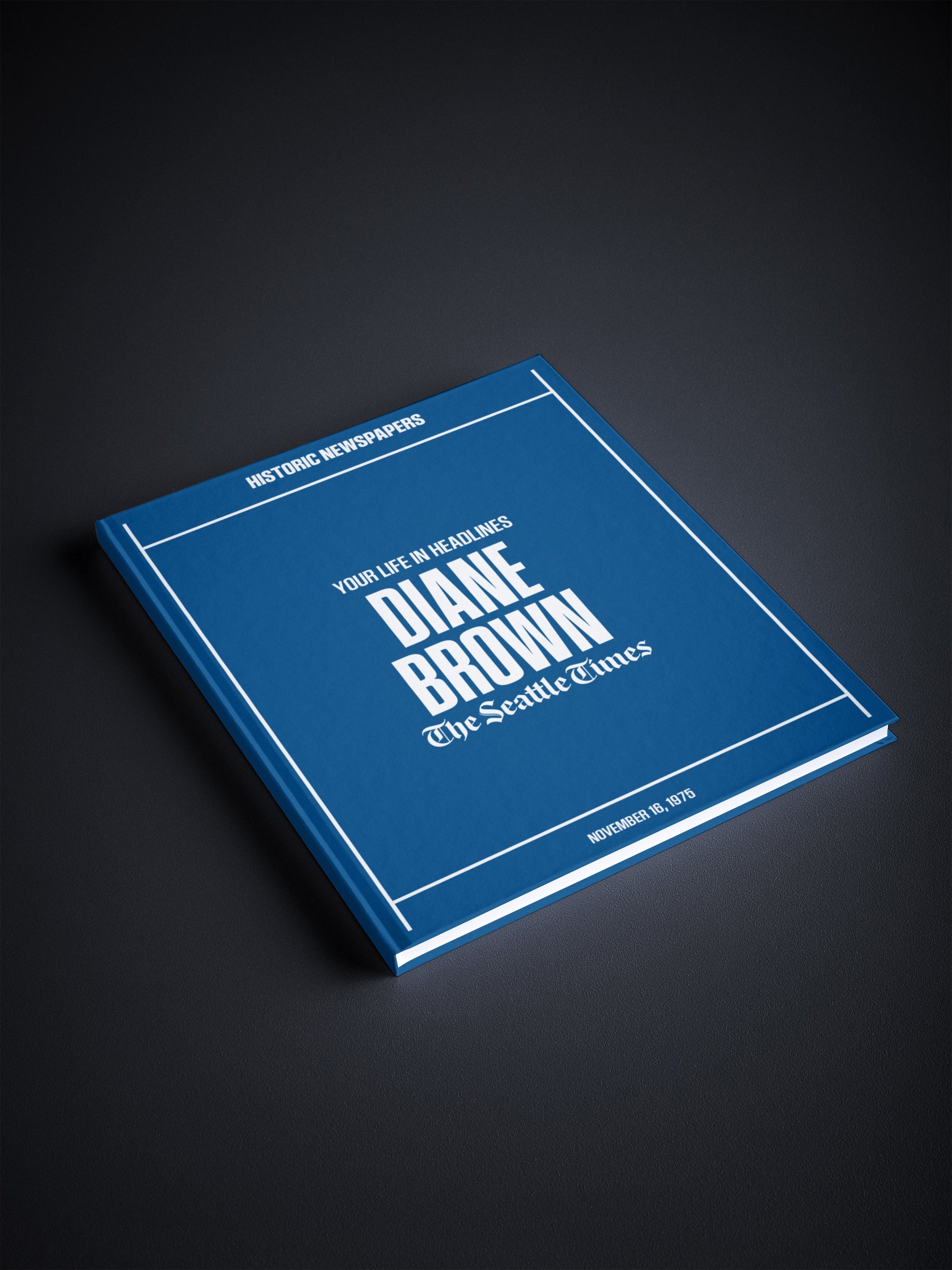 Personalised Seattle Times birthday newspaper book by Historic Newspapers, featuring a vintage edition on a newsstand with a blue cover.