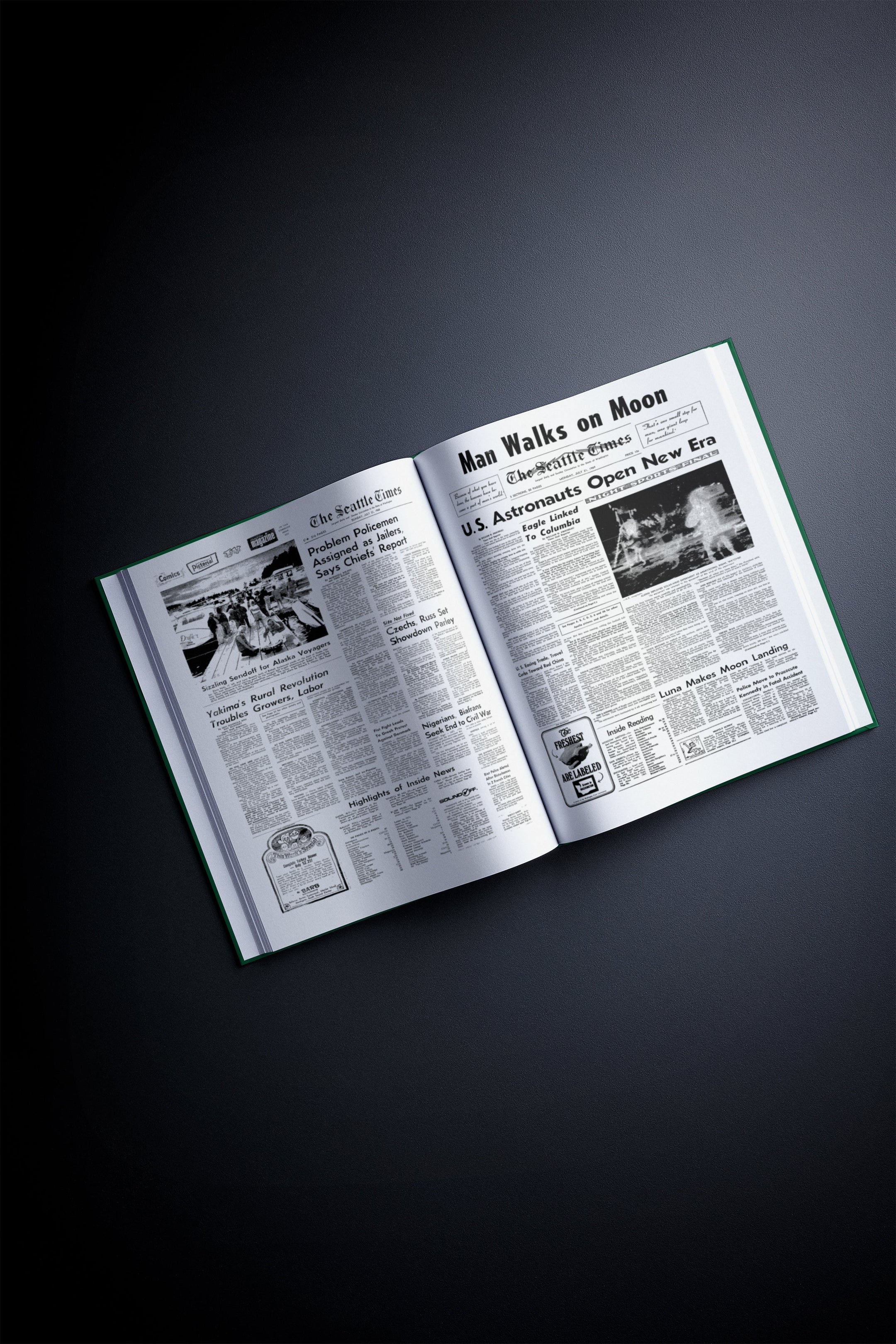 Personalised birthday newspaper book featuring a Seattle Times edition from Historic Newspapers, displayed on a newsstand with a green cover.